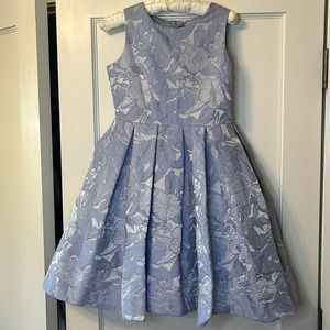 Elegant Party dress for your young ingénue. Icy Blue color with flower design.